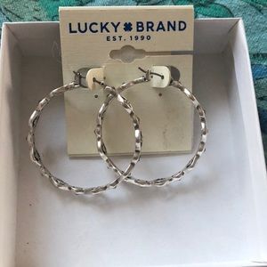 Silver hoop earrings with diamond bead detail